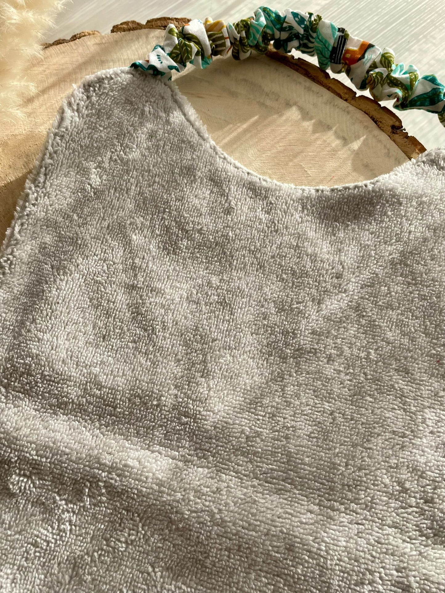 Bavoir élastique